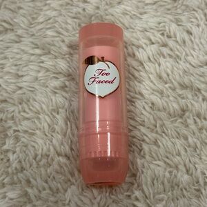 too faced peach bloom color blossoming lip balm playful pink